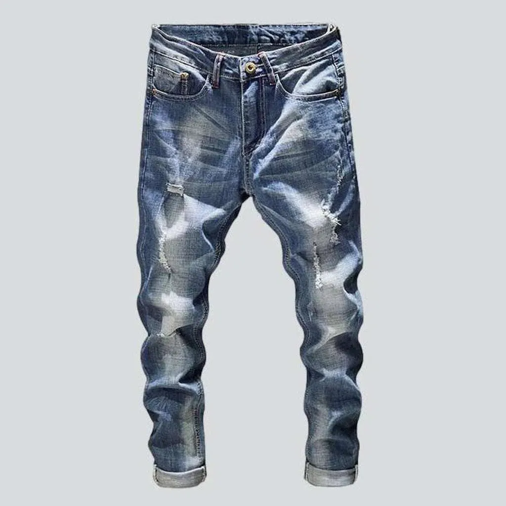 Light wash men's ripped jeans